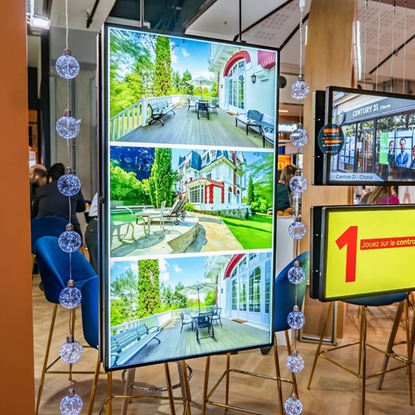 Eco Smart Display installation - Century 21 real estate listings display